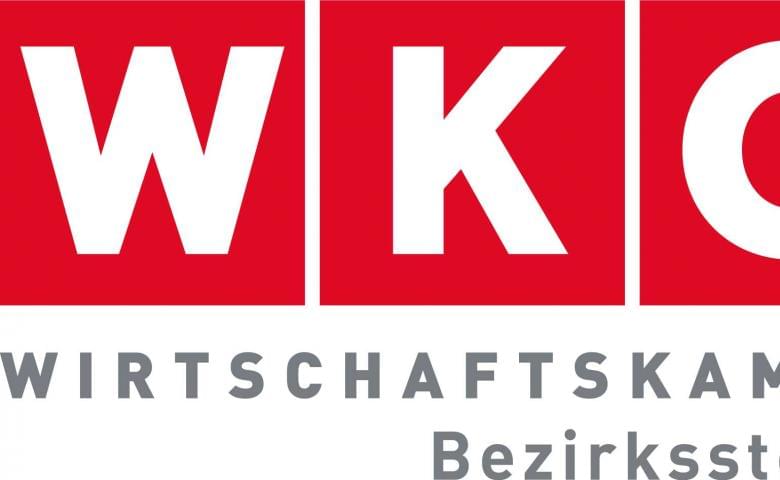 Logo der Wirtschaftskammer Österreich mit rotem Hintergrund und weißen Buchstaben "WKO" in einem Banner-Stil.